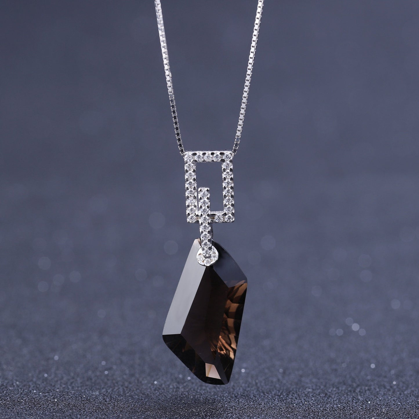 Close-up of the Natural Smoky Quartz Hexagon Pendant with delicate rhodium-plated accents on a 925 sterling silver chain.