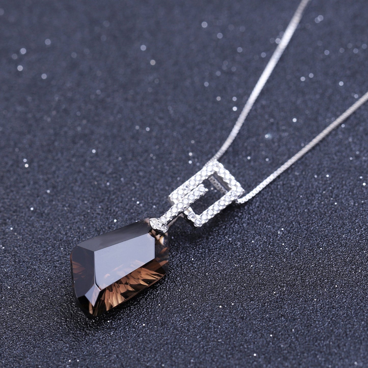 Close-up of the Natural Smoky Quartz Hexagon Pendant with delicate rhodium-plated accents on a 925 sterling silver chain.