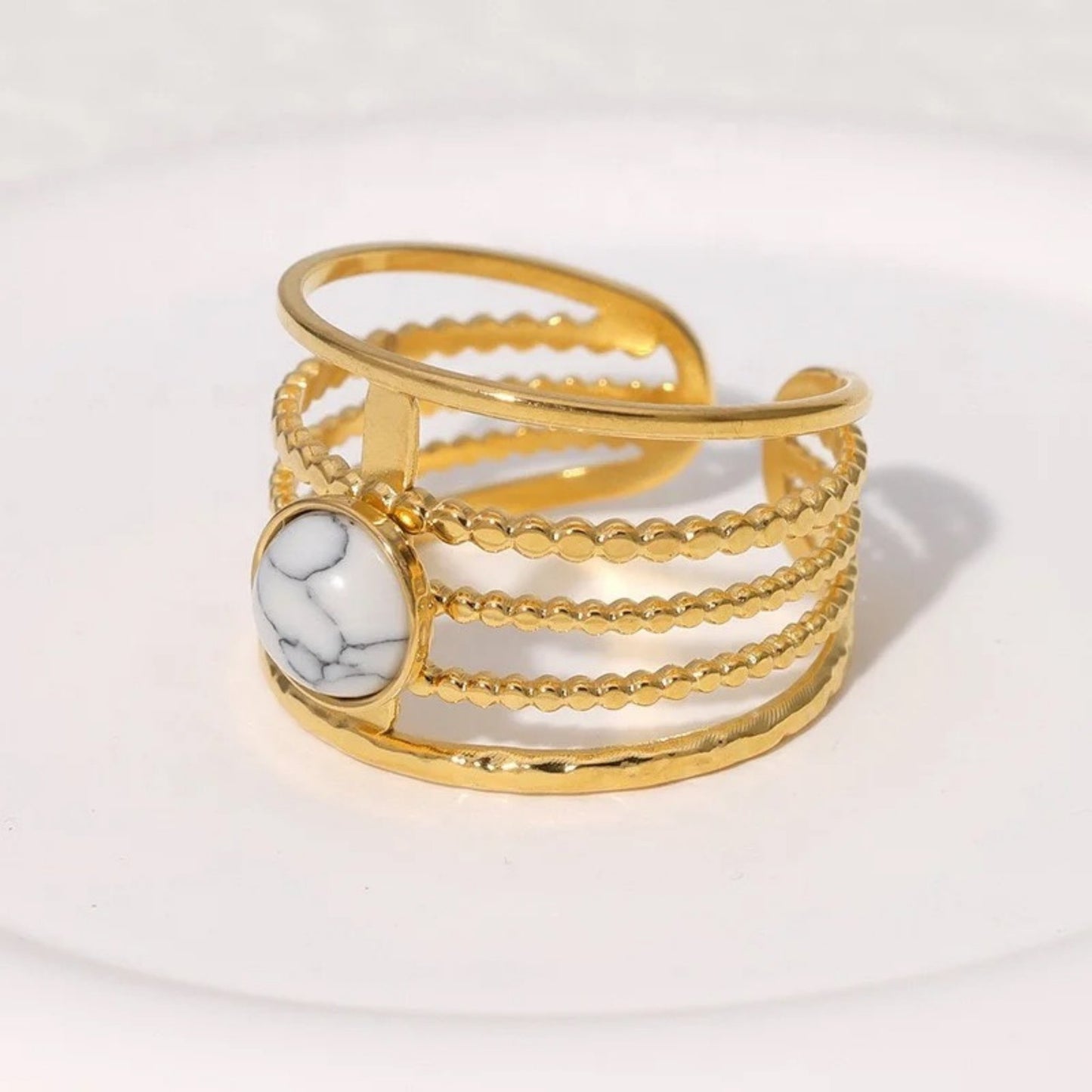 Adjustable Multi-Band Stone Ring in White with a timeless stone centerpiece and modern multi-band design.