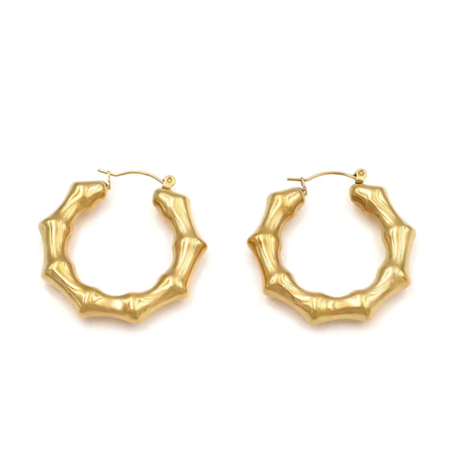 Close-up of Bamboo Twist Hoop Earrings showcasing intricate bamboo details and polished gold finish
