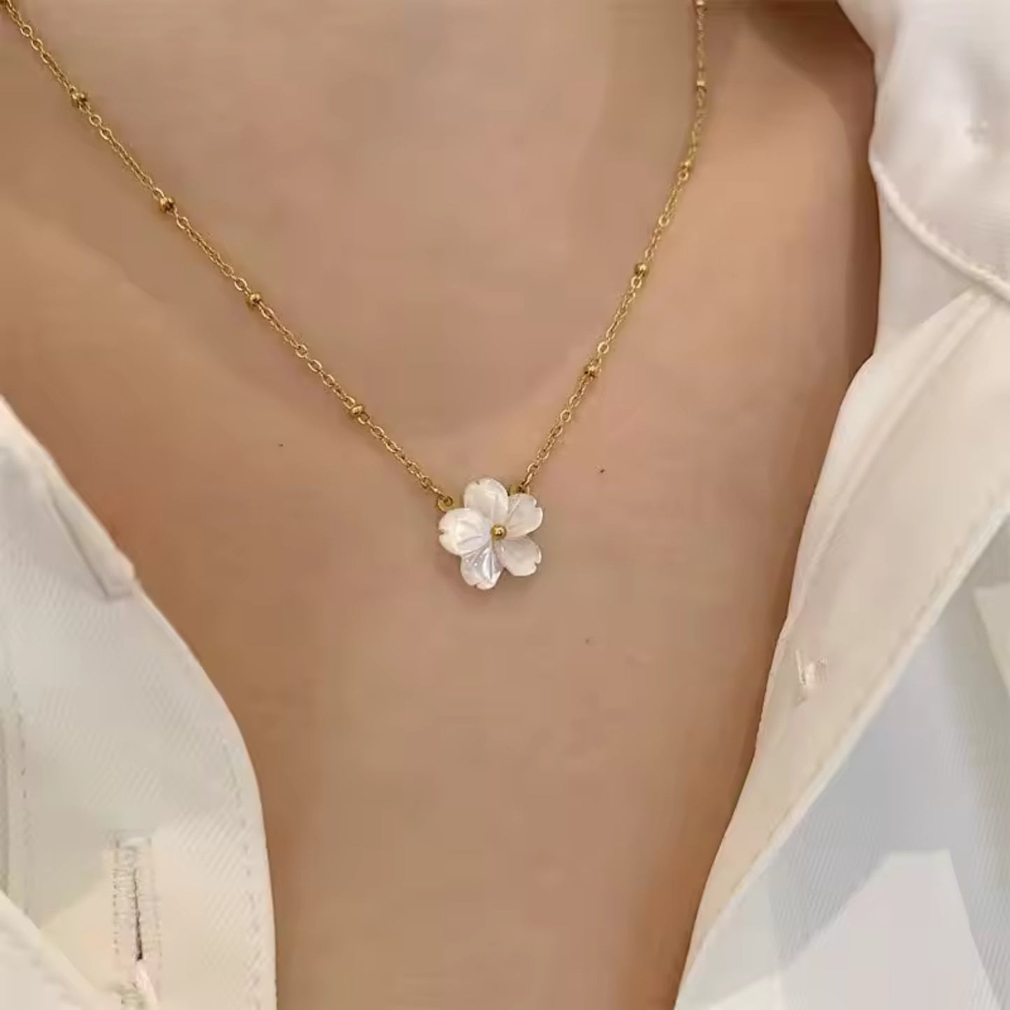 Blossom Beauty Flower Necklace styled with a casual outfit, adding a touch of nature-inspired elegance to the look.