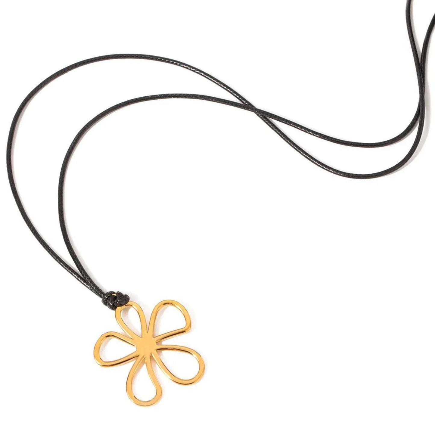 Close-up of the Blossom Bloom Necklace pendant showcasing its intricate open petal floral design in radiant gold.