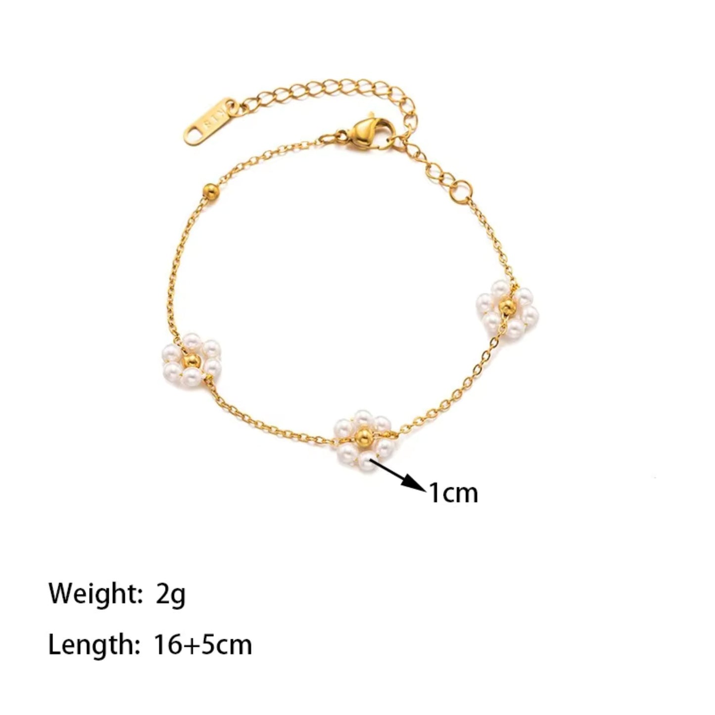 Details of the Close-up of Blossom Elegance Pearl Bracelet featuring intricately designed floral accents with lustrous pearls in an 18K gold-plated finish.