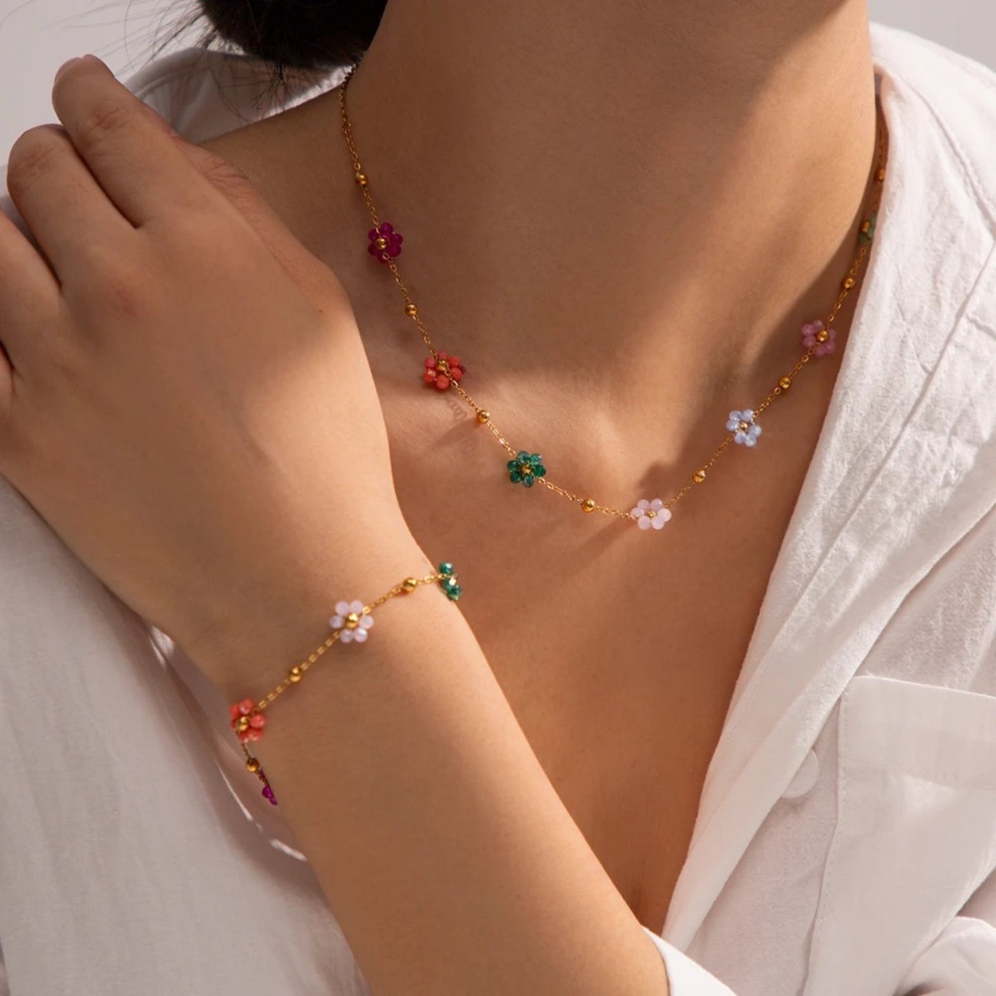 Blossom Radiance Necklace & Bracelet Set styled with a casual outfit, bringing vibrant charm and elegance to the look.