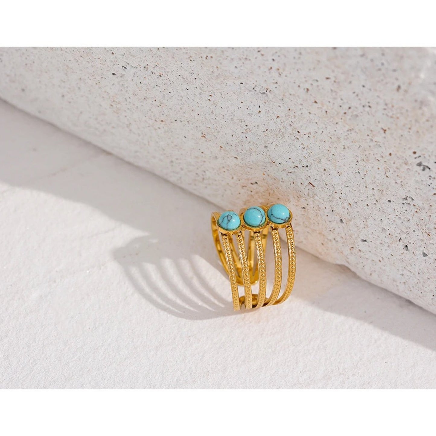 Bohemian Turquoise Ring styled on a hand, adding a vibrant touch to summer or casual looks.