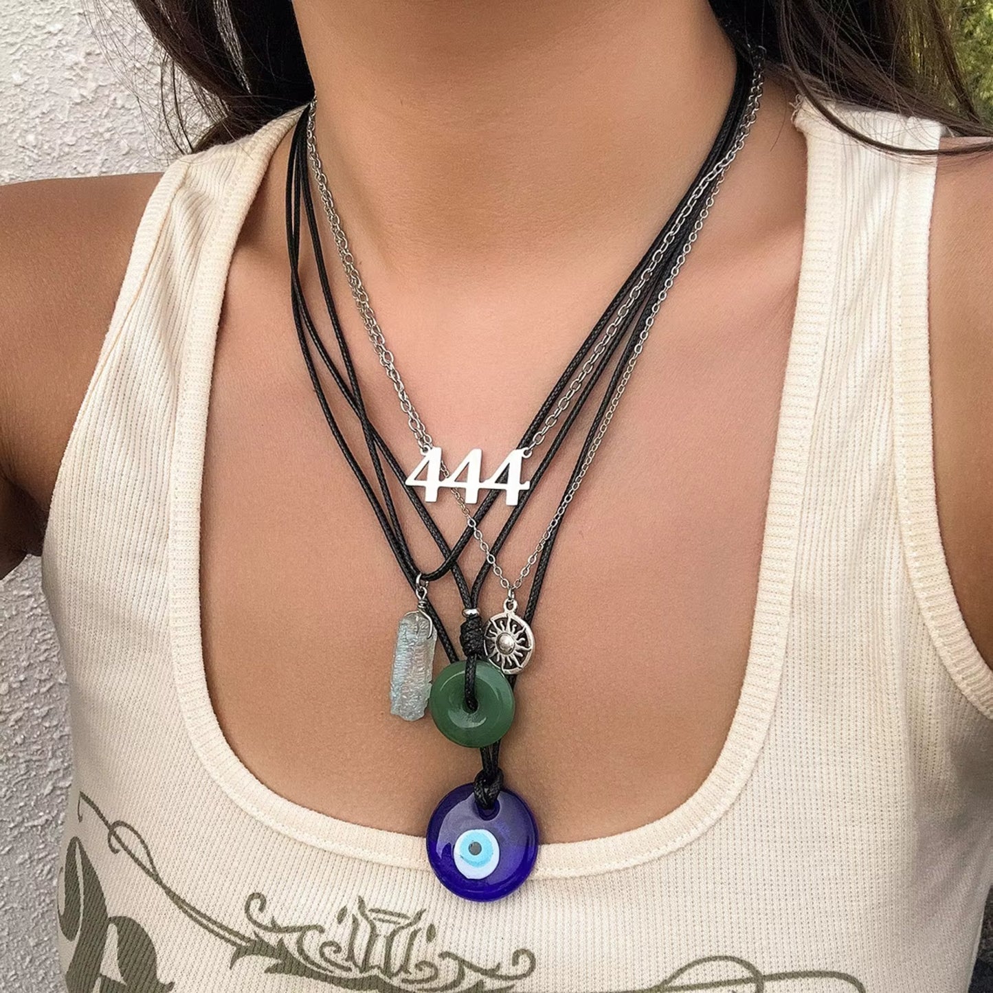 Boho Charm Layered Necklace Set styled on a model, showcasing eclectic layers with colorful charms and bohemian vibes.
