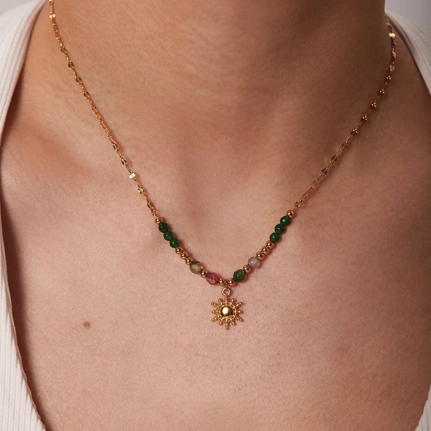 Boho Sun Pendant Necklace, adding vibrant color and bohemian charm.