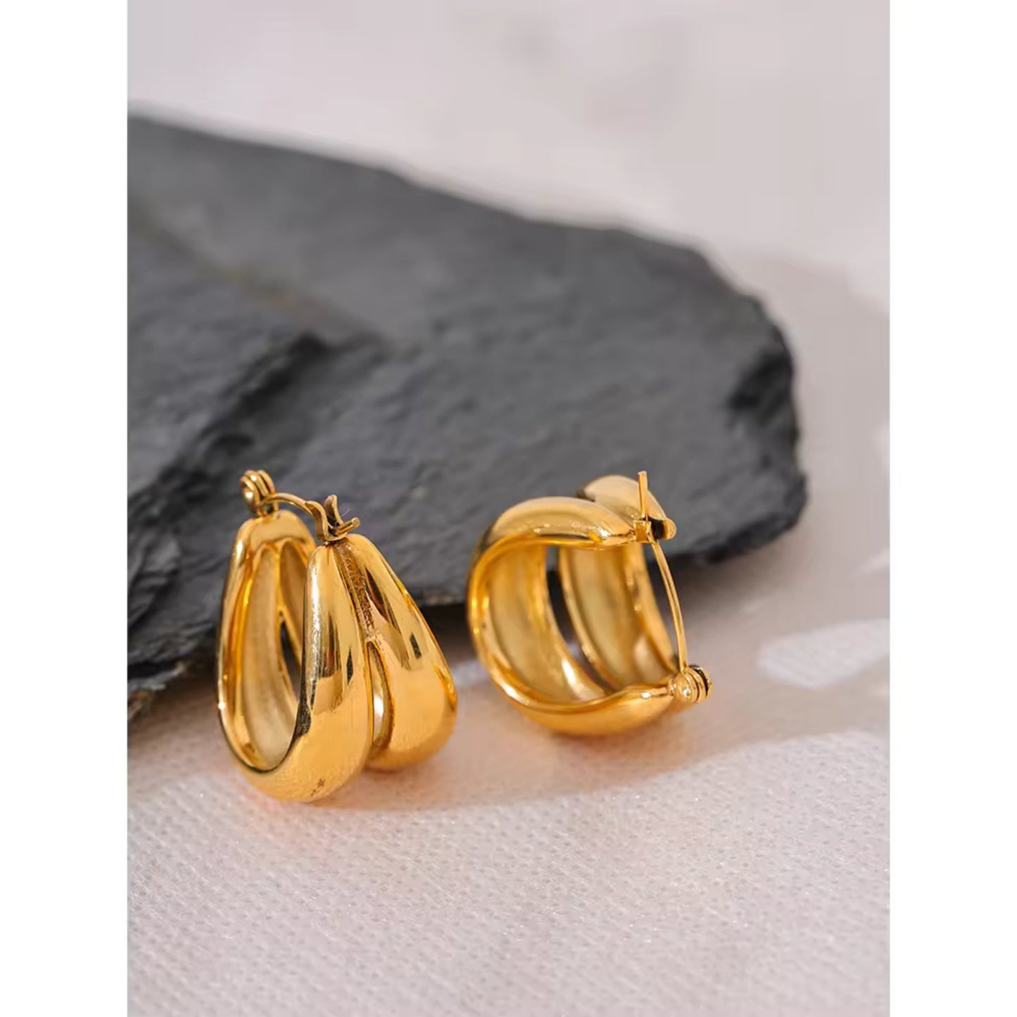 Bold Gold Hoops styled for everyday or evening wear, adding a touch of sophistication.
