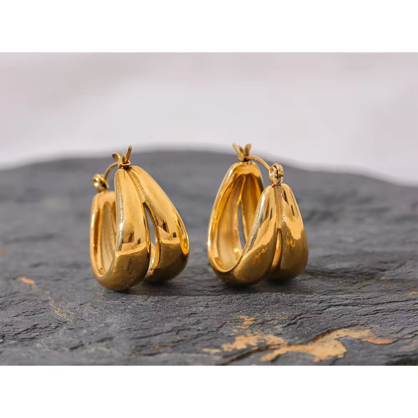Bold Gold Hoops styled for everyday or evening wear, adding a touch of sophistication.