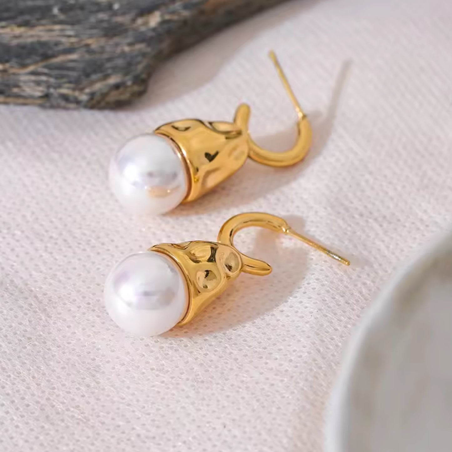 trendy in UAE Pearl Drop Earrings styled for casual or formal occasions, offering bold yet refined elegance.