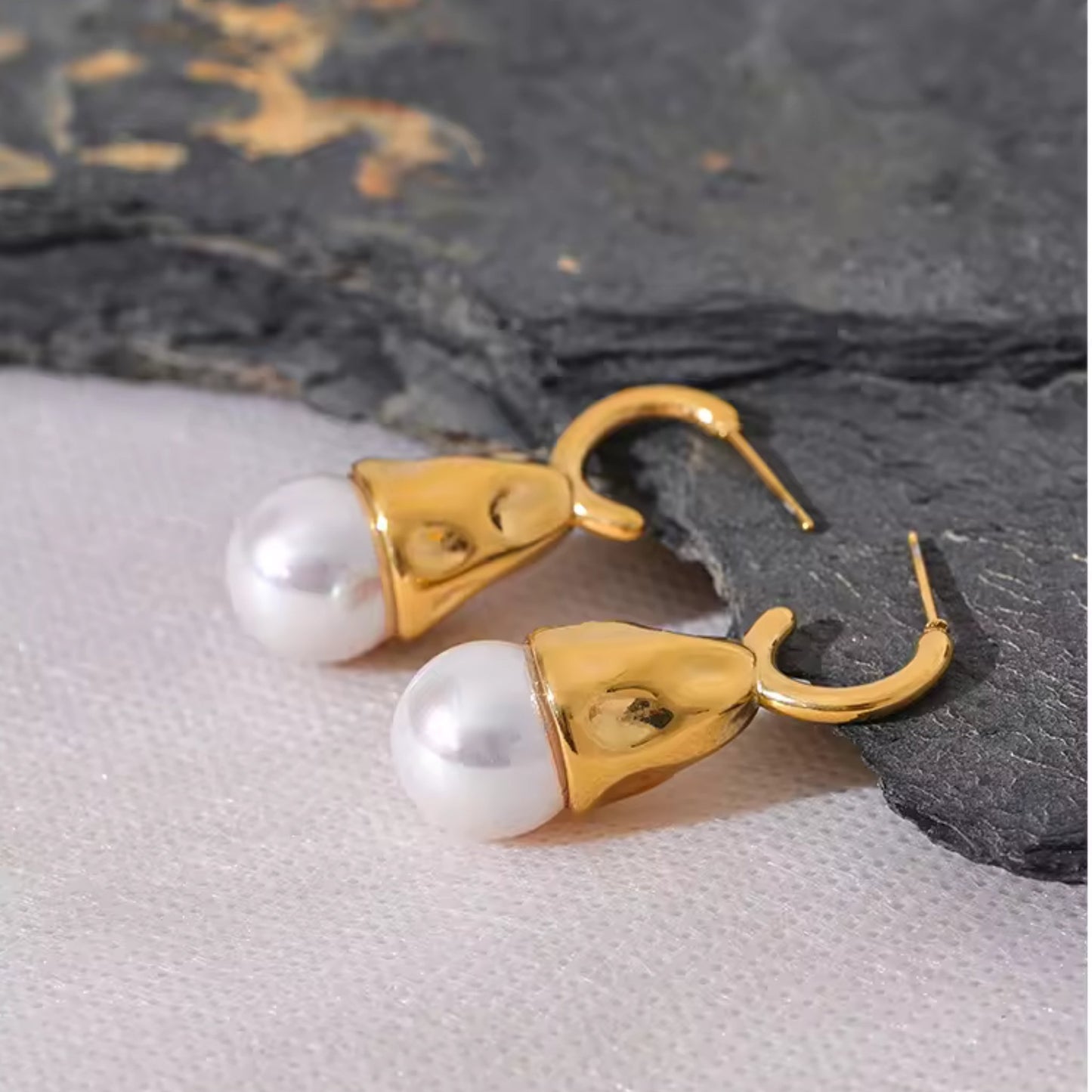 Bold Pearl Drop Earrings with lustrous imitation pearls encased in sculpted 18K PVD gold-plated caps.