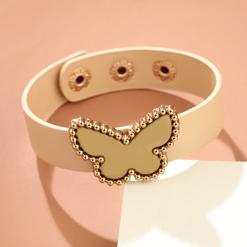 Butterfly Acrylic PU Leather Bracelet in beige with a soft PU leather strap and charming butterfly acrylic detail.