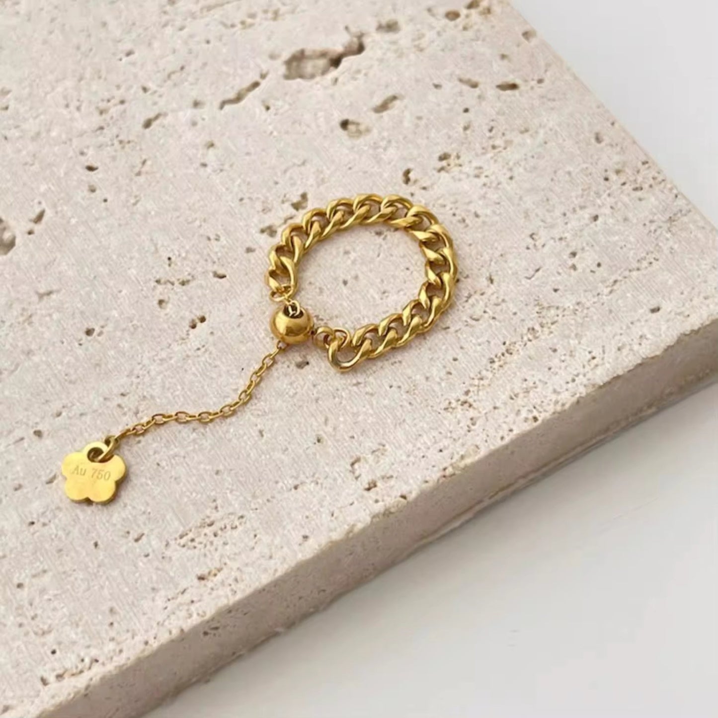 Detailed view of the chain-link ring from the CharmLink Adjustable Duo Ring Set, highlighting its bold and contemporary style.