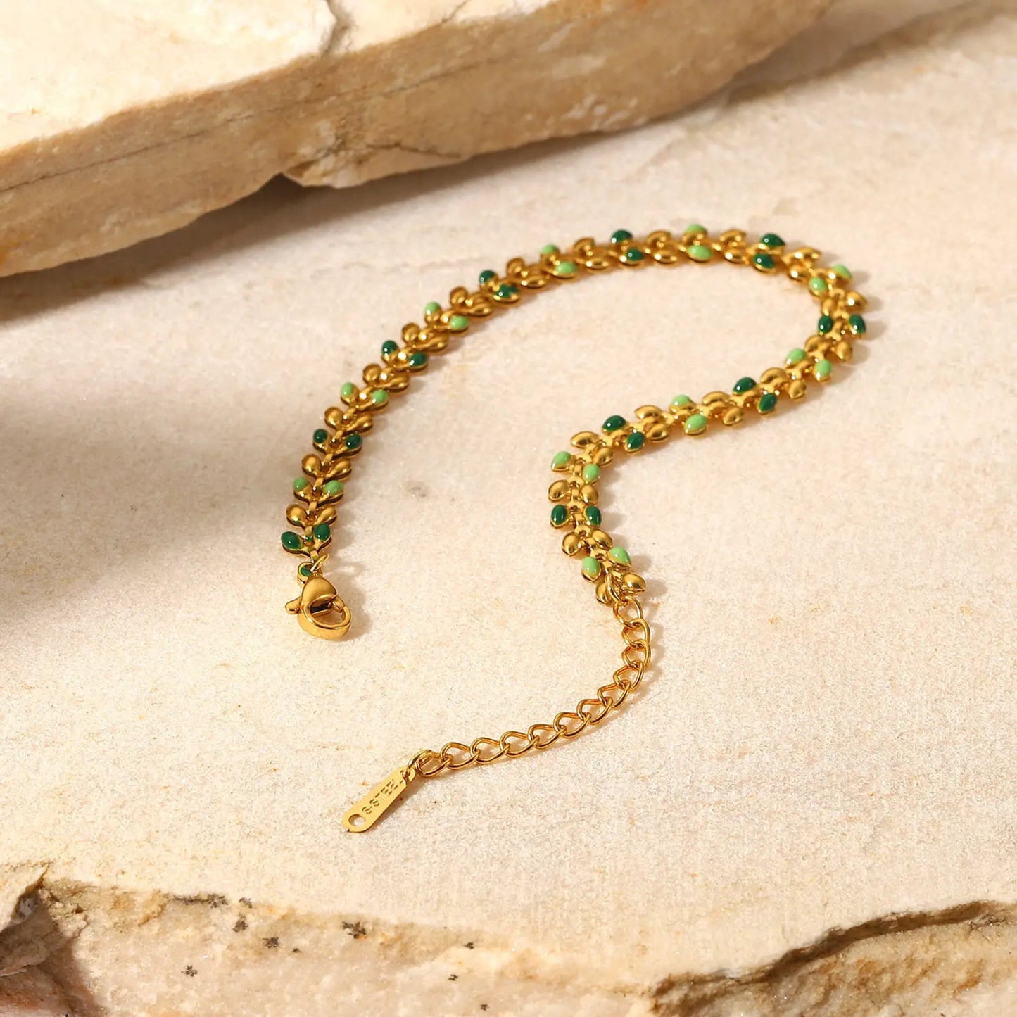 Detail of the adjustable chain and secure clasp on the Colorful Leaf Drop Bracelet, ensuring a perfect fit.