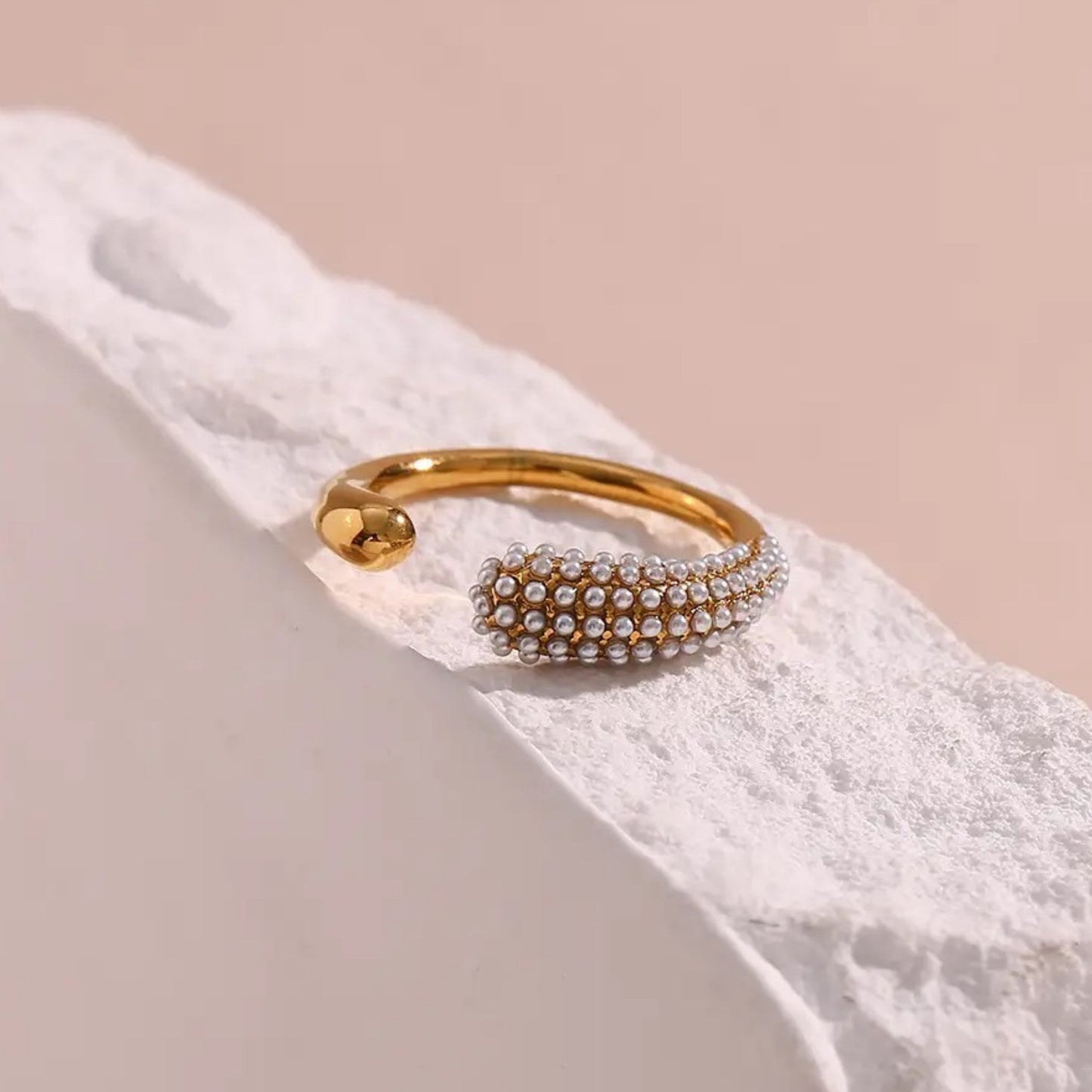 Close-up of the Crystal Curve Adjustable Ring, showing the open band design for a comfortable fit.