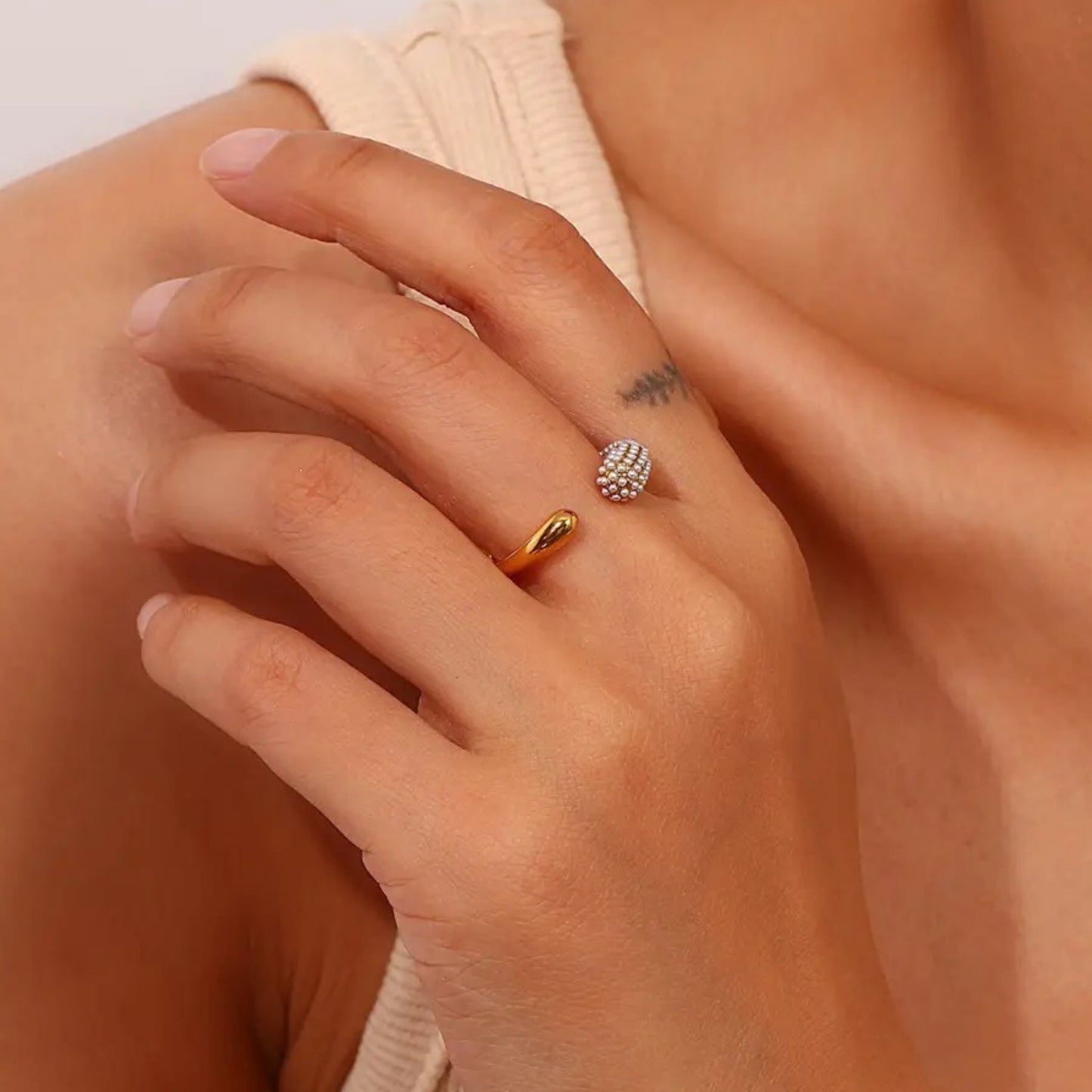 Crystal Curve Adjustable Ring styled on a hand, showcasing its elegant and modern look.