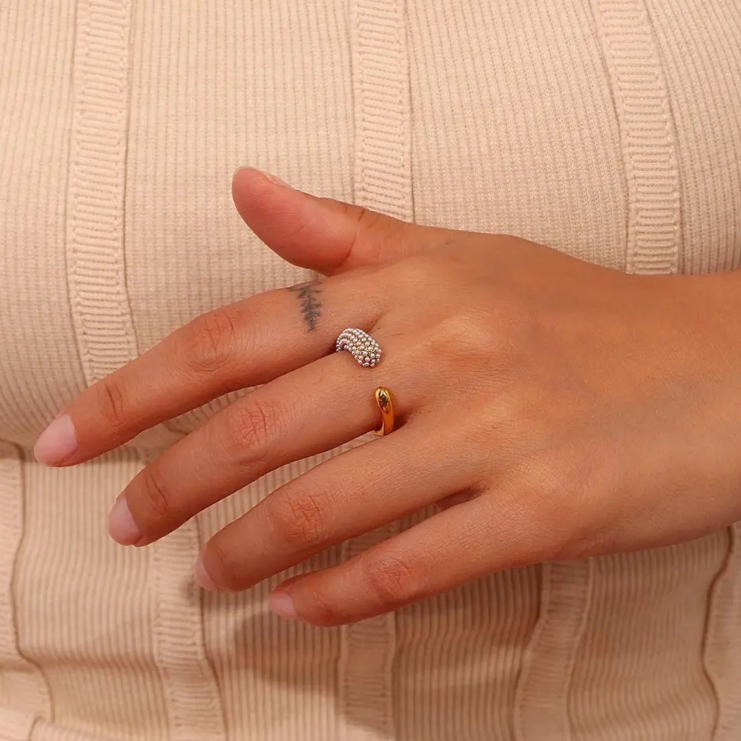 Close-up of the Crystal Curve Adjustable Ring, showing the open band design for a comfortable fit.