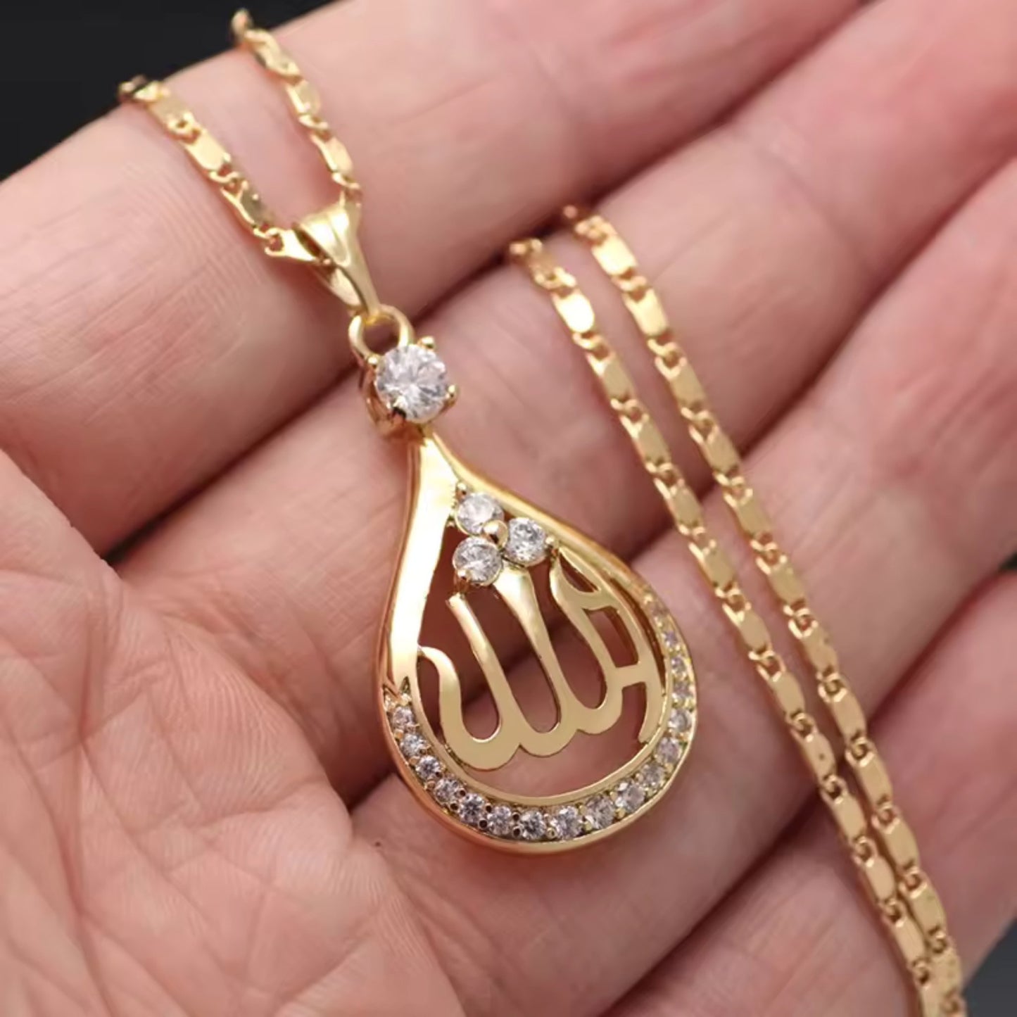 Divine Elegance Allah Pendant Necklace with sparkling CZ stones on an 18K gold-plated brass chain.