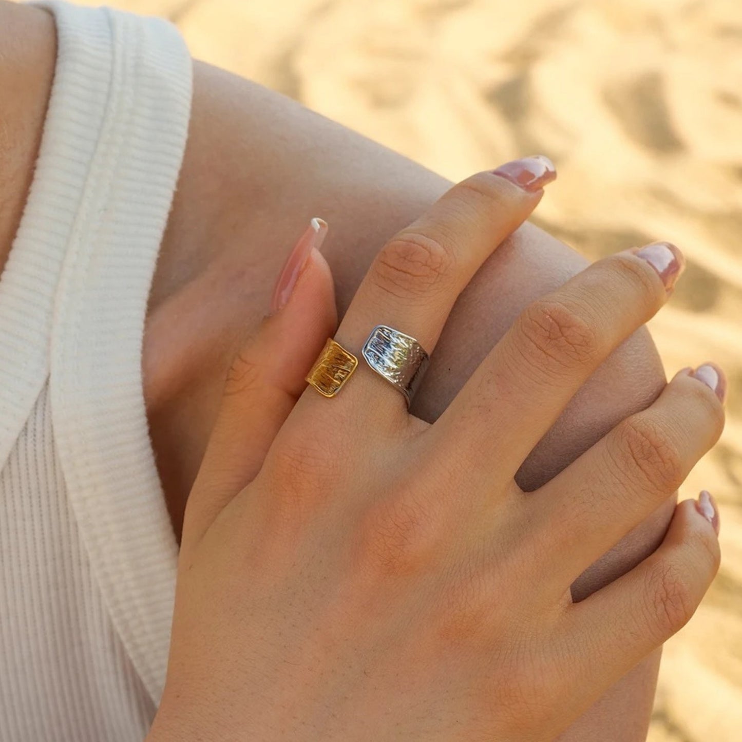 Model wearing the Dual Tone Textured Adjustable Ring, showcasing its modern half gold, half silver design.