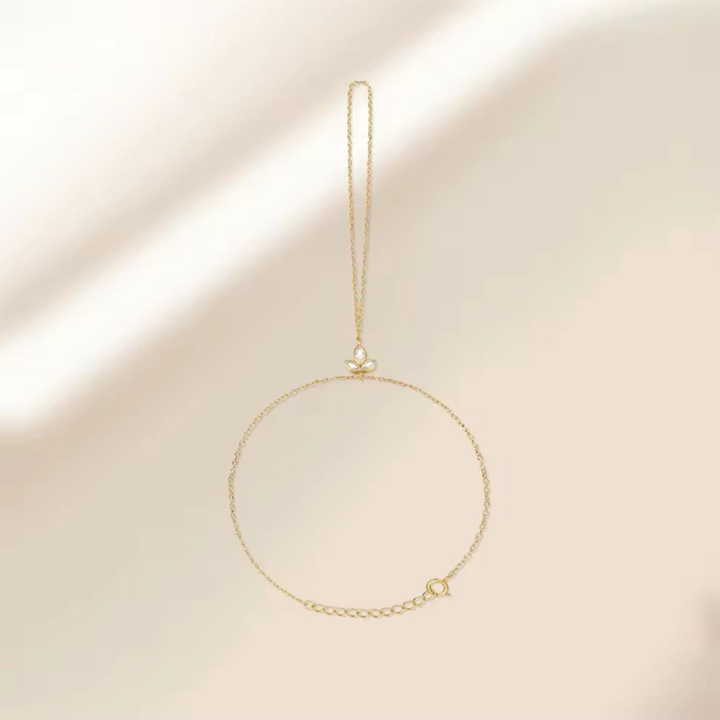 Flat lay of the Ethereal Grace Chain Ring Horse Eye Bracelet on a white background, emphasizing its delicate design and adjustable chain.