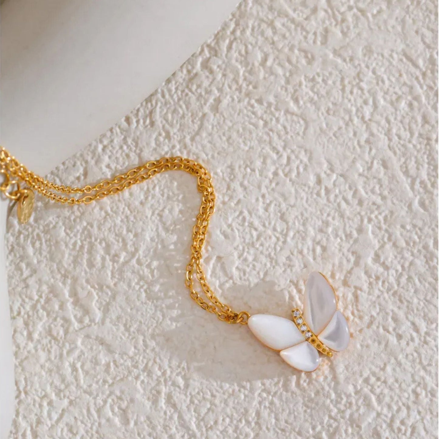 Side View of Butterfly Pendant Highlighting Shell Wings