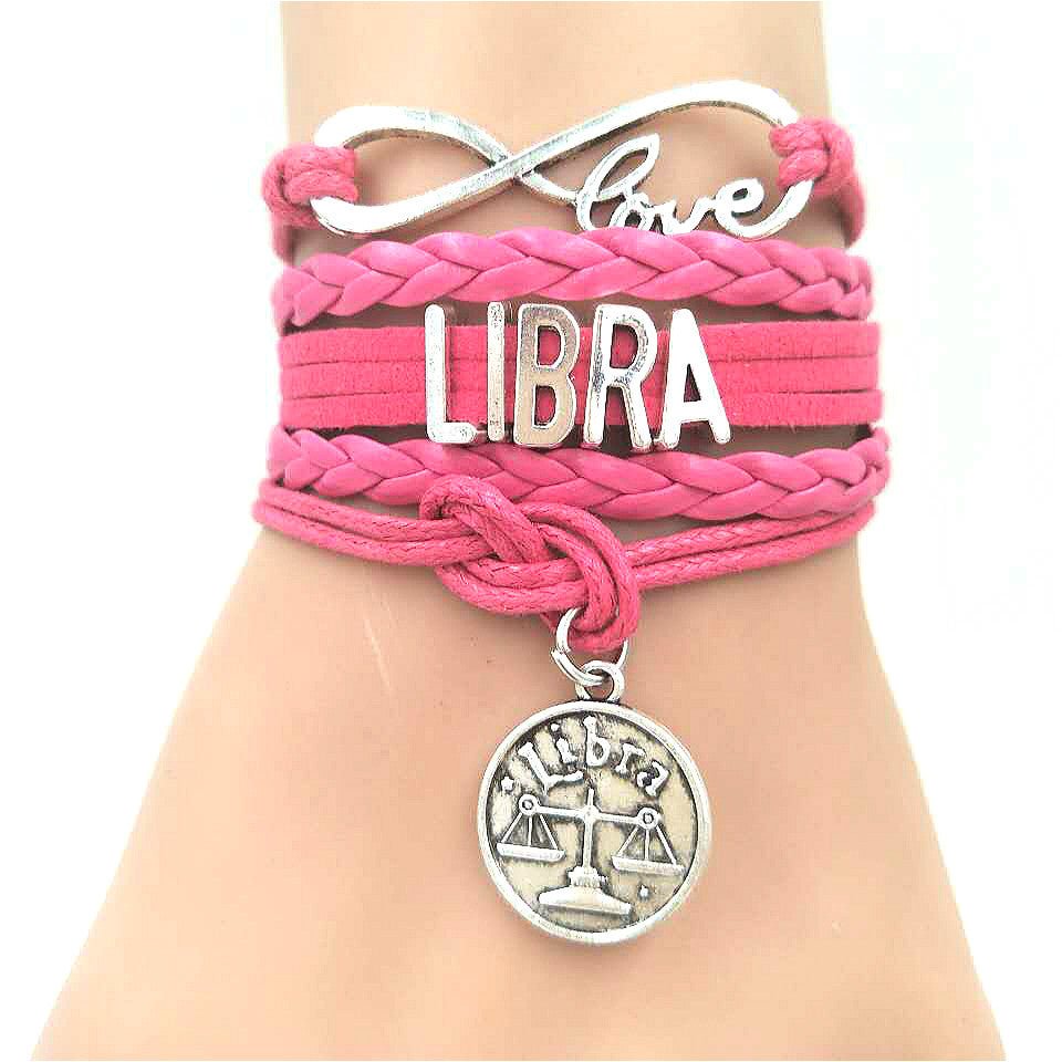 Model Wearing the Horoscope Braided Leather Bracelet for Women. Comes in 12 options