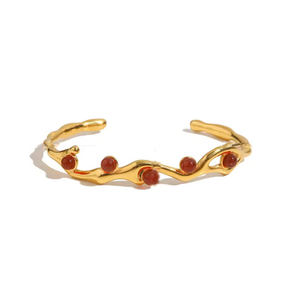18K gold plated adjustable vine bangle bracelet with a choice of red gemstone, featuring a delicate vine design and durable stainless steel construction