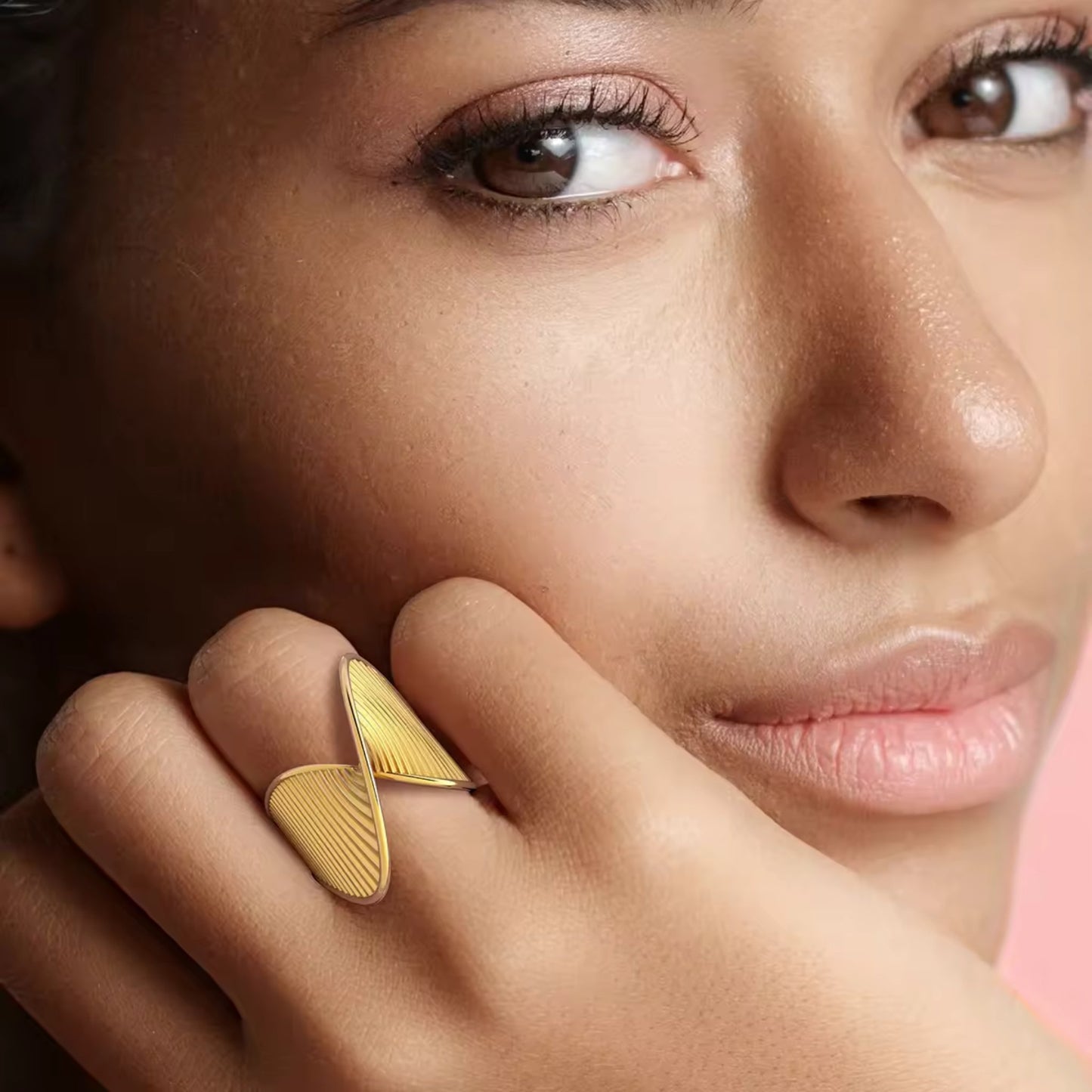 18K Gold Plated Wave Texture Ring with a unique wave-inspired design and intricate texture detail, shown on a model's hand for an elegant look.