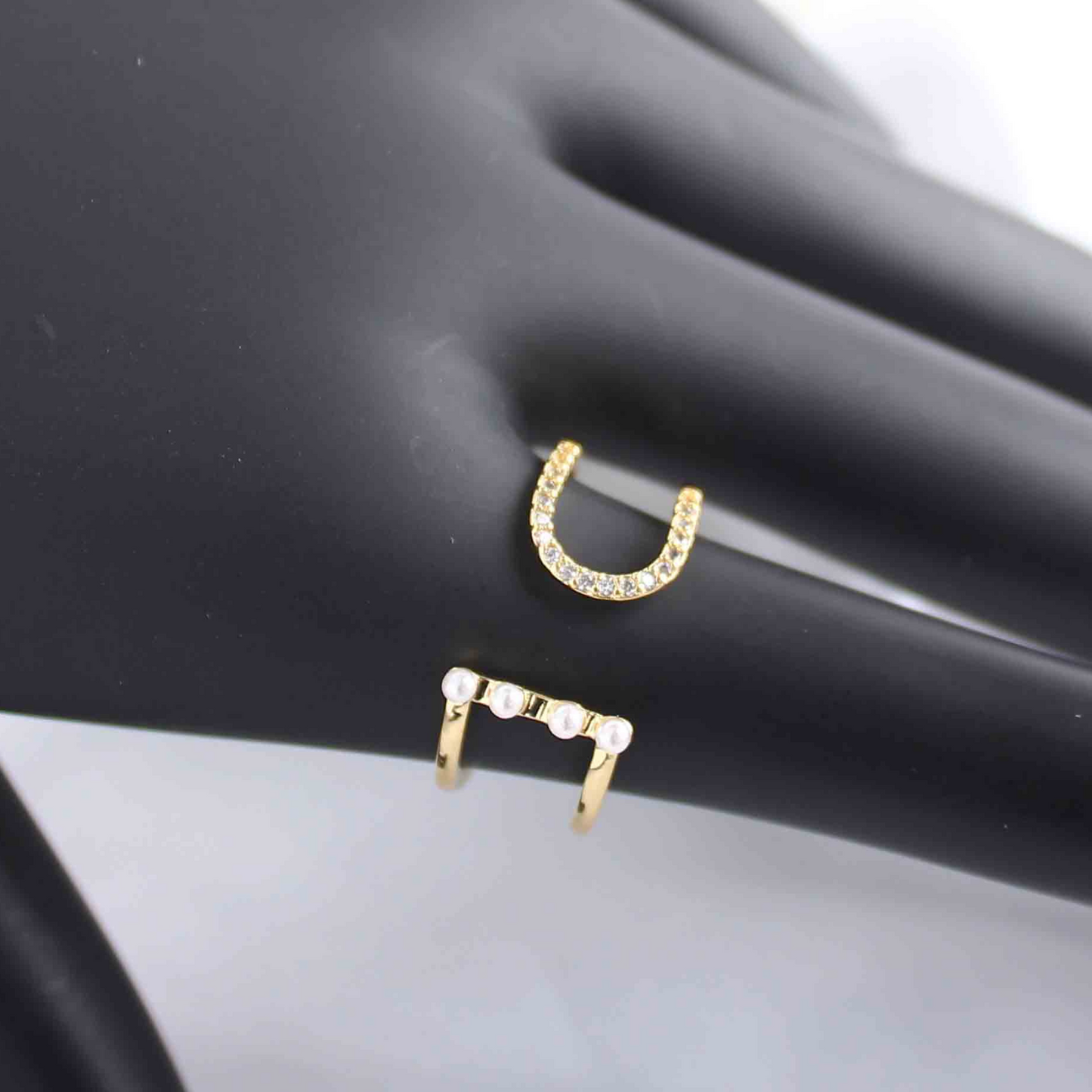 Side view of the adjustable gold-plated ring with three cultured pearls, highlighting its high-quality craftsmanship.