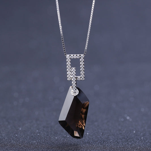Close-up of the Natural Smoky Quartz Hexagon Pendant with delicate rhodium-plated accents on a 925 sterling silver chain.
