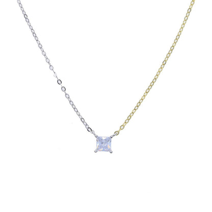 Close-up of the square-shaped white zirconia pendant on a 925 Sterling Silver Two-Tone Chain Necklace with 18K gold and platinum plating.