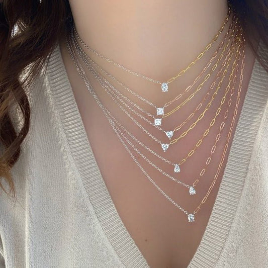 925 Sterling Silver Two-Tone Chain Necklace with a white zirconia pendant in a square shape, shown on a model for an elegant and modern look.