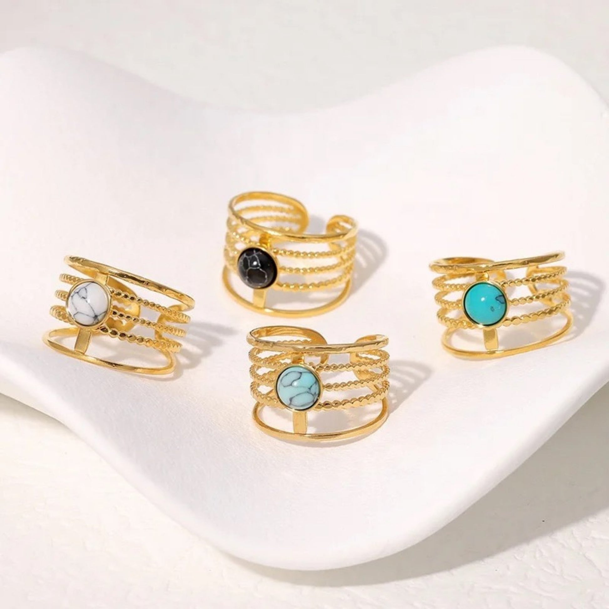 Collection of Adjustable Multi-Band Stone Rings in Black, White, Turkuaz, and Sky Blue, highlighting their elegant design and vibrant stones.