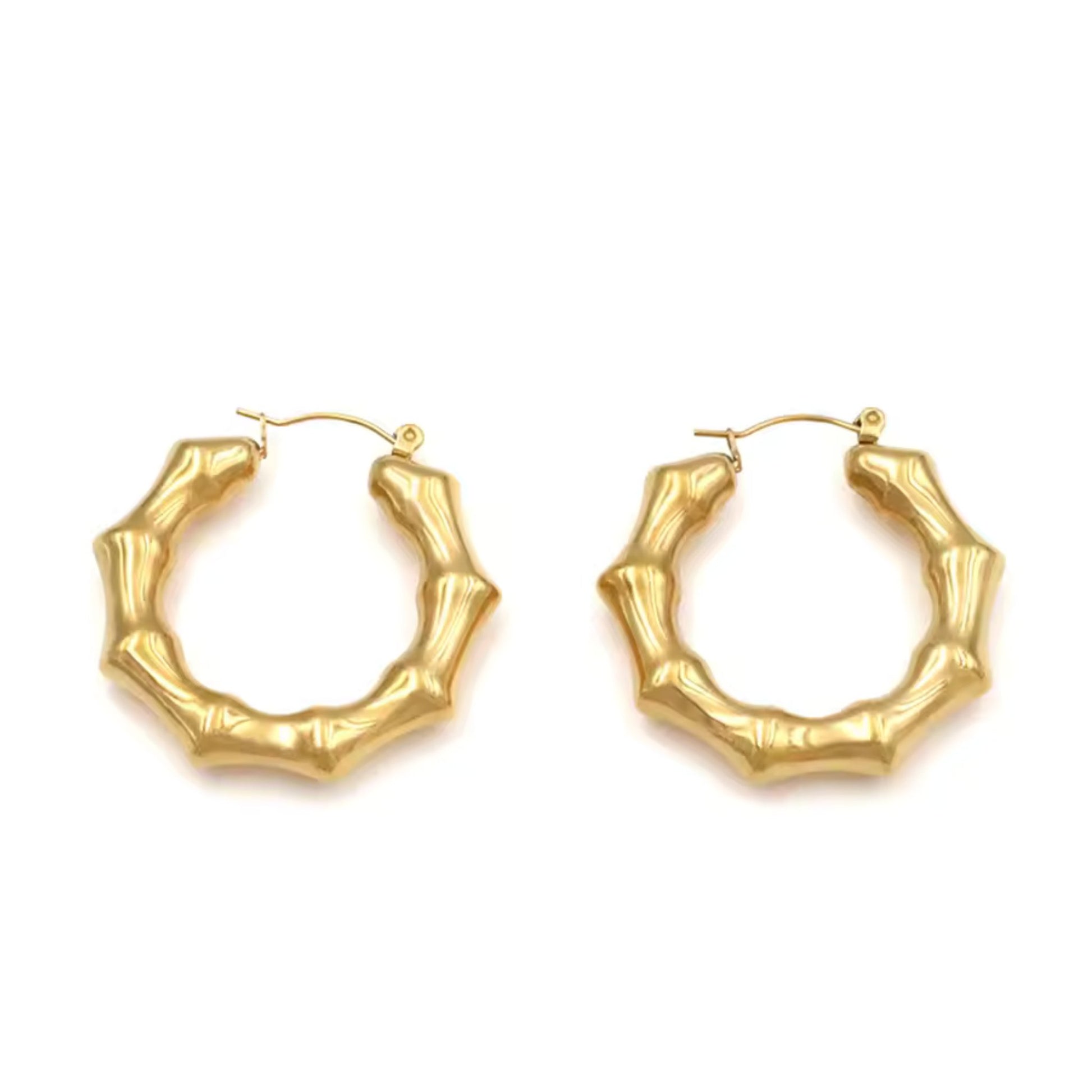 Close-up of Bamboo Twist Hoop Earrings showcasing intricate bamboo details and polished gold finish