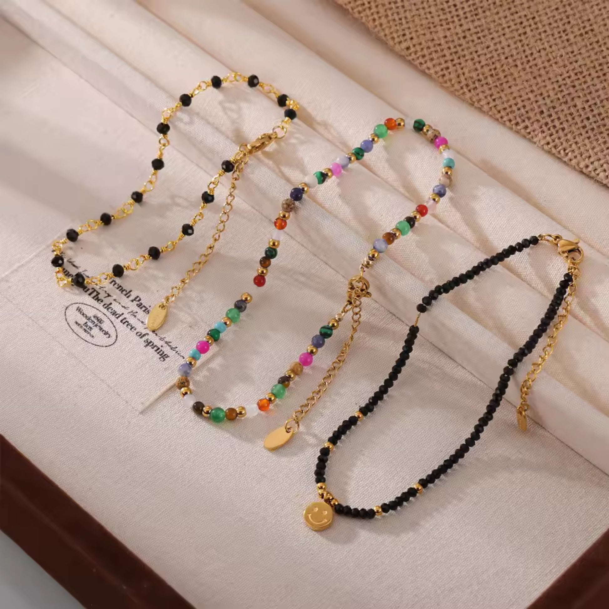 Beaded Charm 18K Gold Plated Anklets styled with beachwear, adding a touch of glamour and vibrancy to a summer outfit.