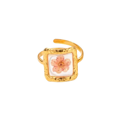 Square-shaped Blooming Elegance Floral Open Ring with delicate pressed flowers and 18K gold-plated finish.
