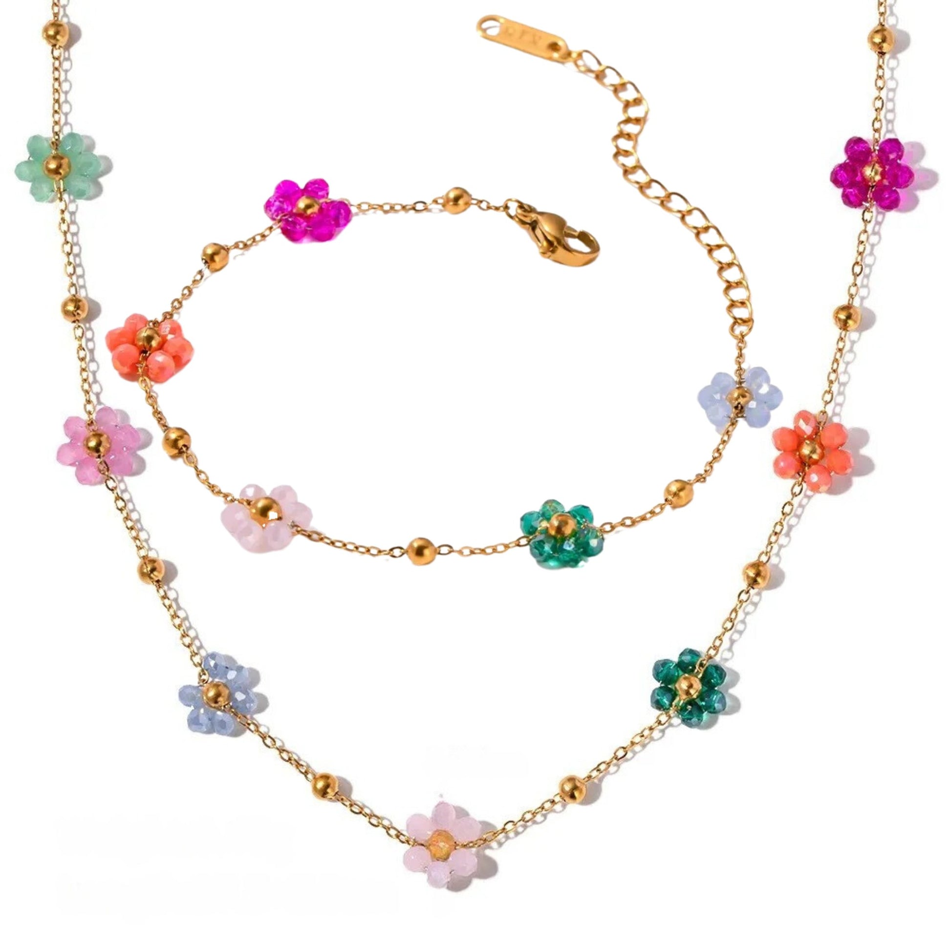 Blossom Radiance Necklace & Bracelet Set with 18K gold plating and colorful floral charms, showcasing playful elegance.