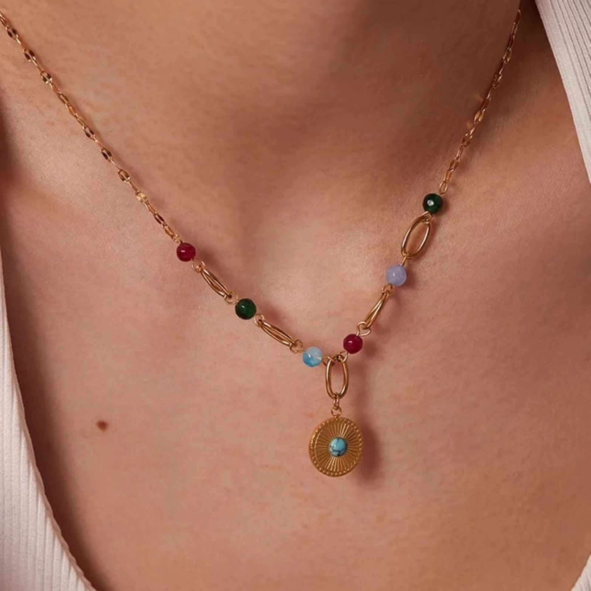 Bohemian Multi-Stone Pendant Necklace featuring colorful semi-precious stones and a gold-plated chain, perfect for vibrant styling.