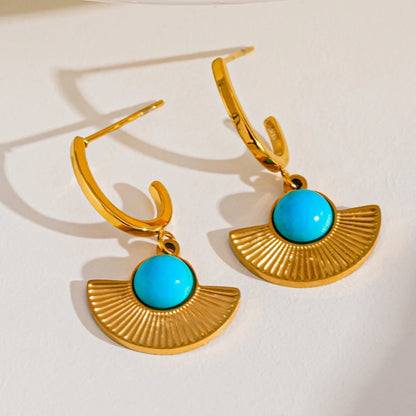 Bohemian Radiance Earrings with a fan-shaped design and natural turquoise stone set in 18K gold-plated stainless steel.