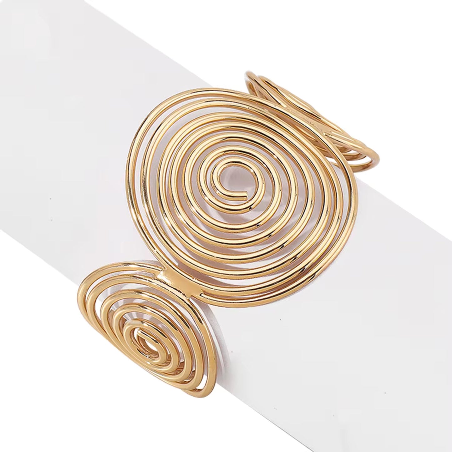 Close-up of the Bohemian Spiral Wire Cuff Bracelet's intricate spiral wire design, crafted with high-quality alloy in gold.