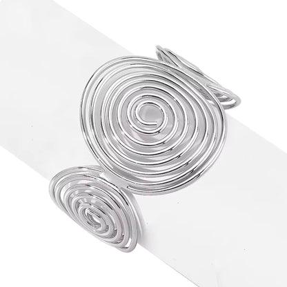 Close-up of the Bohemian Spiral Wire Cuff Bracelet's intricate spiral wire design, crafted with high-quality alloy in silver.