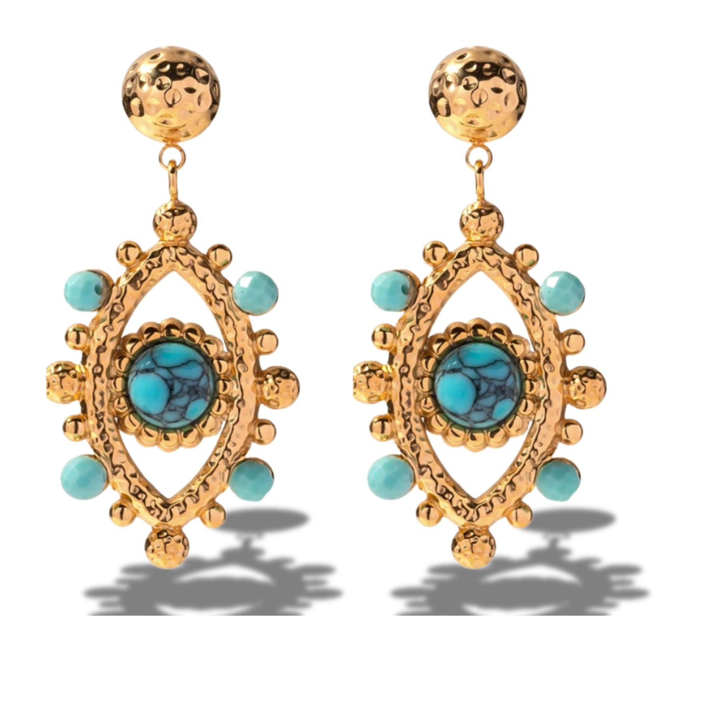 Close-up of Turquoise Medallion Earrings showcasing hammered gold texture and natural turquoise accents.
