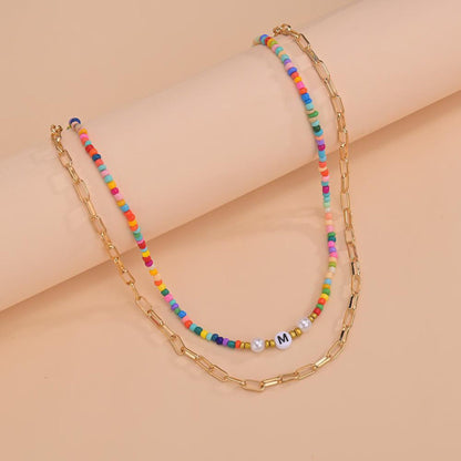 Layered Bead Necklace styled for music festivals or casual outfits, adding vibrant color.