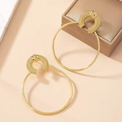 Oversized trendy elegant Gold Hoop Earrings styled for boho.