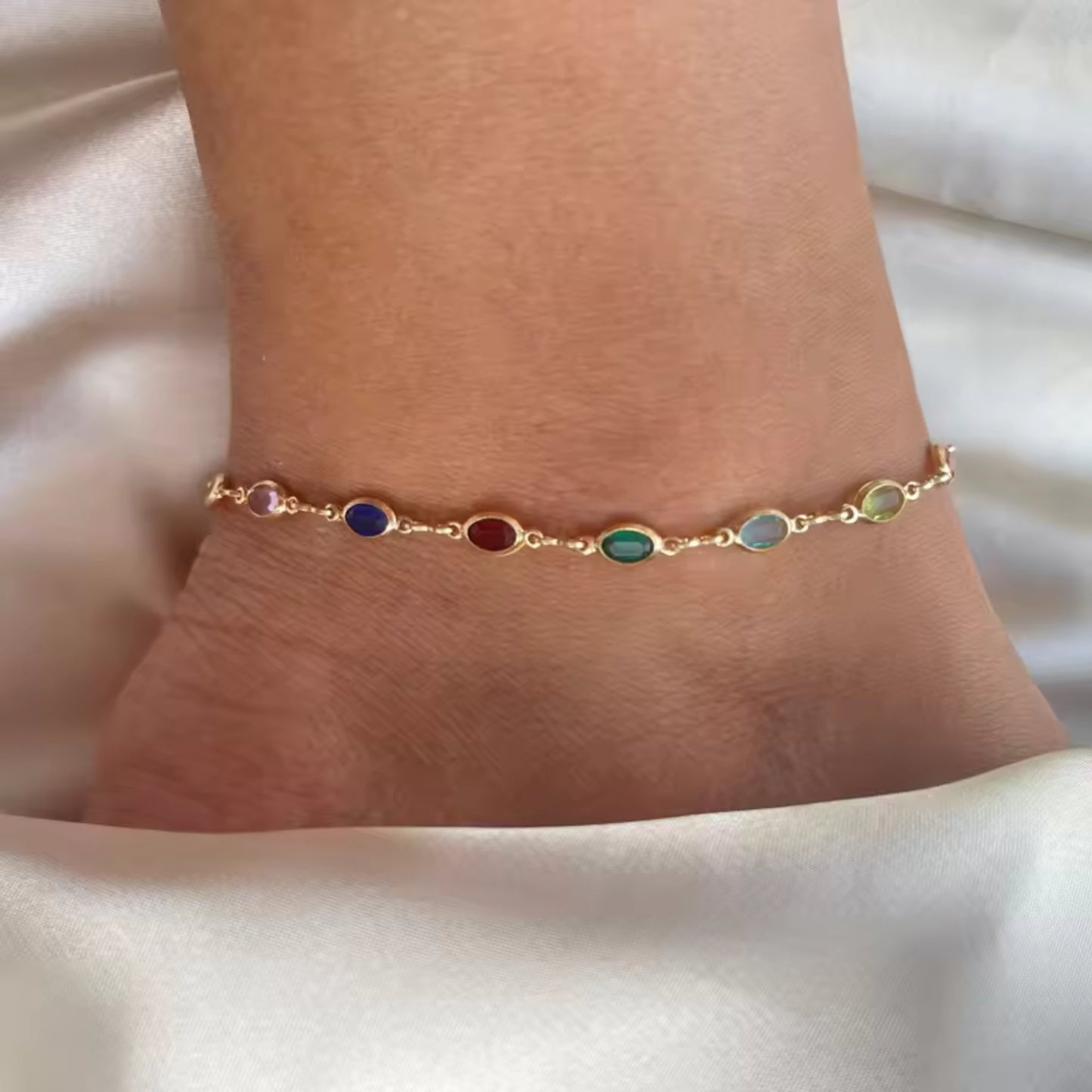 Boho Rainbow Crystal Anklet with multicolored crystals set in a gold-plated frame for a vibrant, bohemian style.