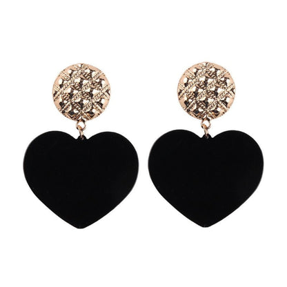 Bold Heart Acrylic Drop Earrings in Black with a gold-tone stud, perfect for making a playful statement.