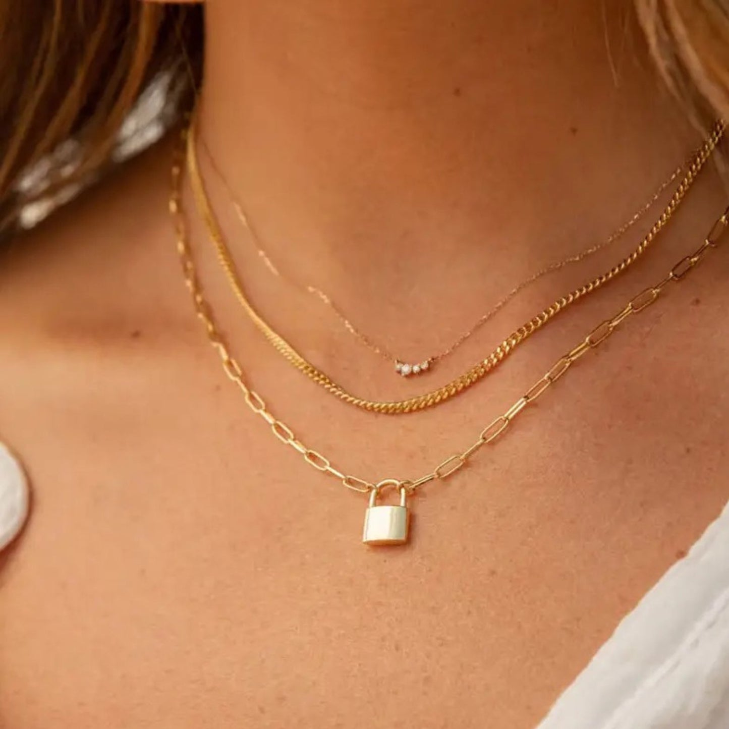 Lock Pendant Necklace styled for casual or formal looks, adding a modern touch.