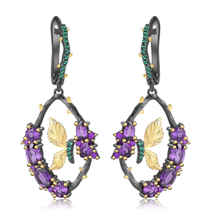 Amethyst and Emerald Sterling Silver Earrings featuring a branch motif with natural amethyst and nano emerald stones, crafted in 925 sterling silver with black gun and gold plating.