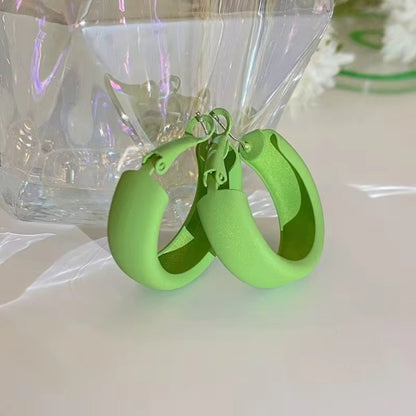 Candy Color Circle Acrylic Earrings in fresh green, crafted from lightweight acrylic with a secure clasp closure.