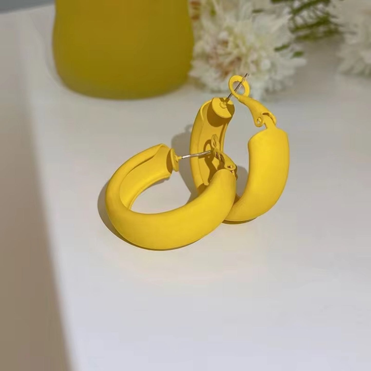 Candy Color Circle Acrylic Earrings in vibrant yellow, featuring a bold hoop design and lightweight acrylic material.